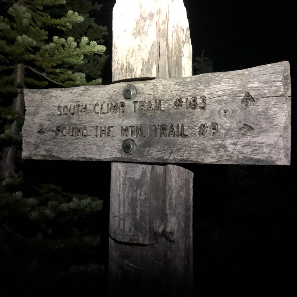 Trail sign at night
